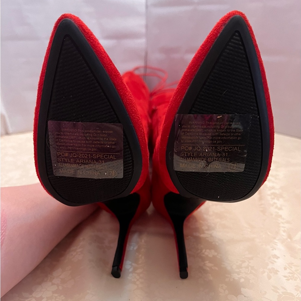 Women’s red suede like material sz 7.5 with a 4” heel. - Picture 8 of 10